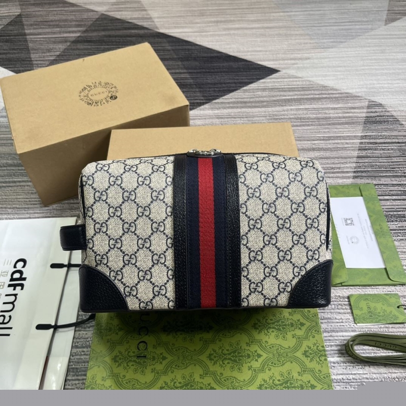G*u*i cosmetic bags